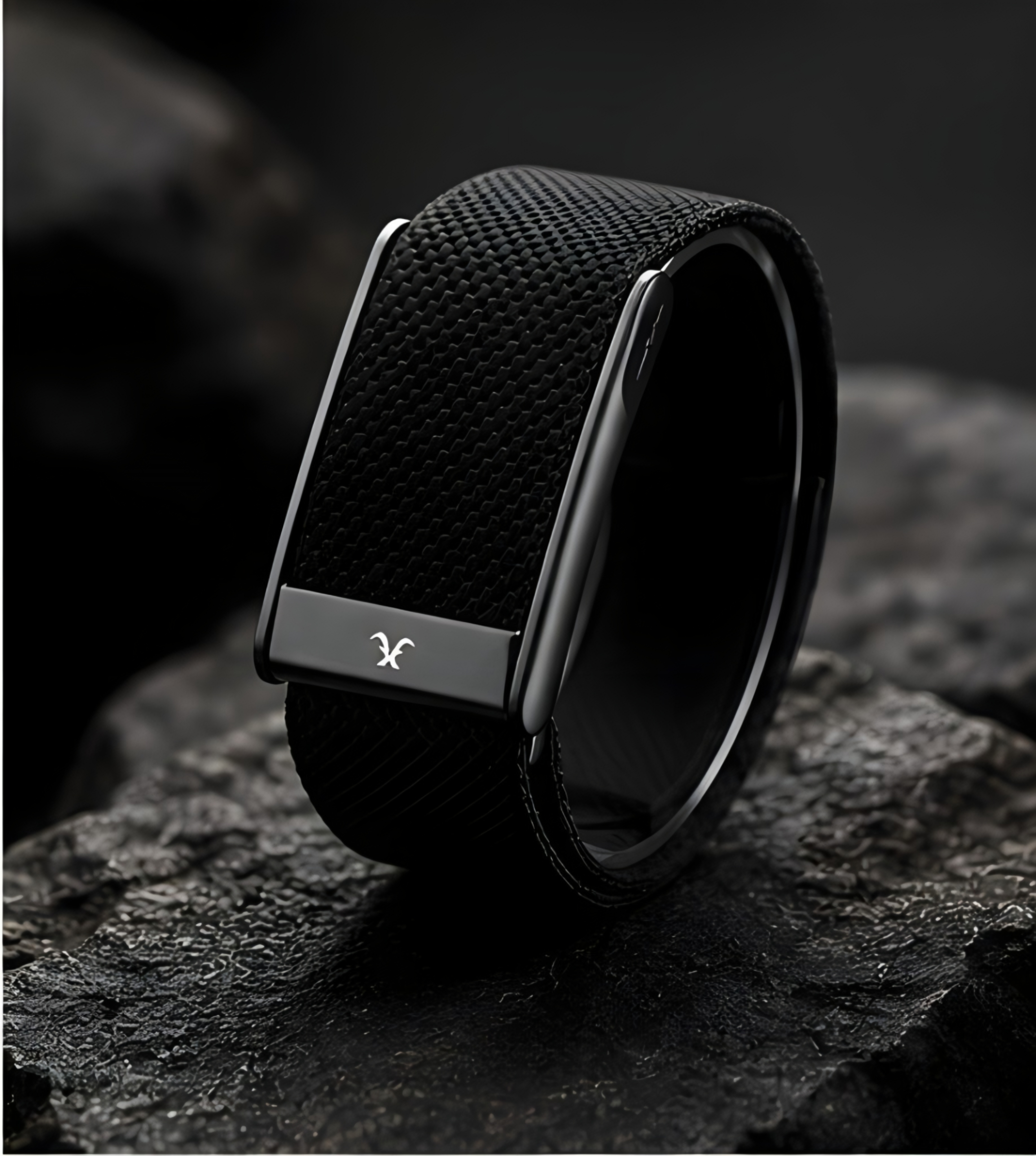 GOATX Onyx Black screenless fitness band on a rock